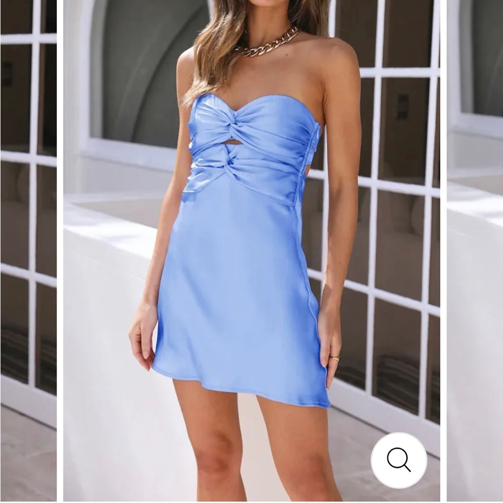 Beautiful silk blue dress never worn size 2